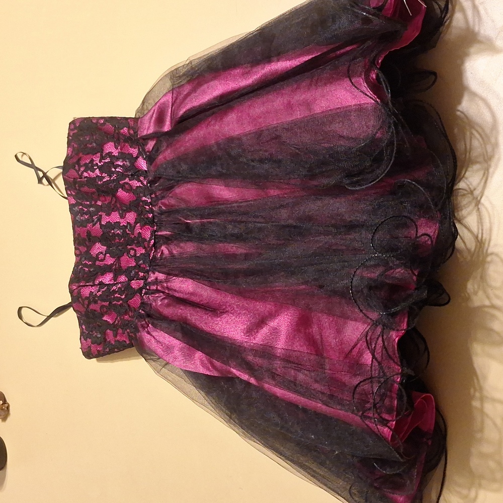Strapless pink and black party dress.